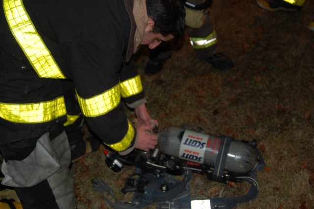 Training at Weekapaug Inn 1/09/08

Probationary FF Jared Gingerella adjusts his SCBA